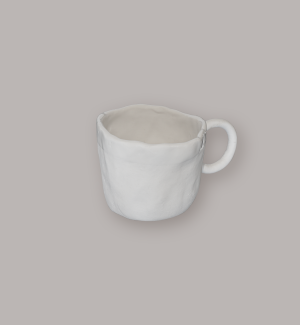 Majhna porcelanasta skodelica Majhna porcelanasta skodelica